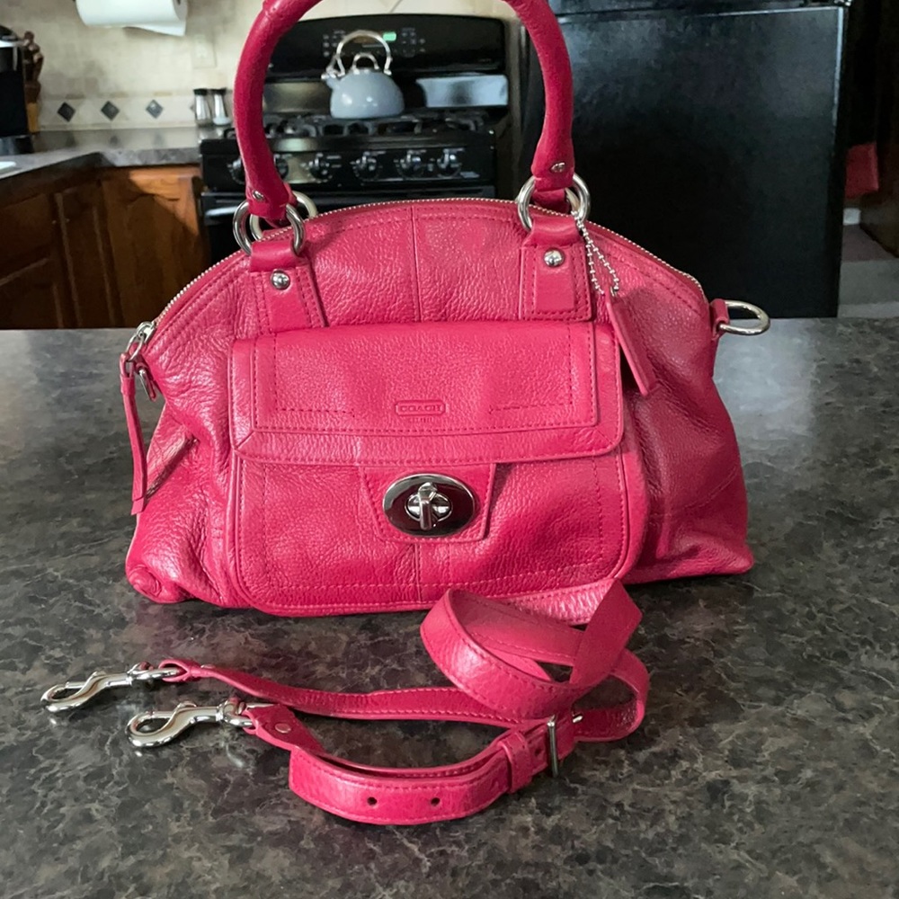 Like new coach purse. Long strap and two handles.